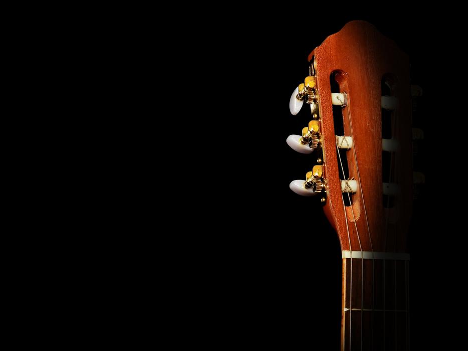 acoustic guitar in the dark