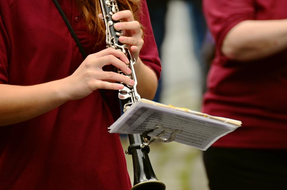 unrecognizable girl plays Clarinet
