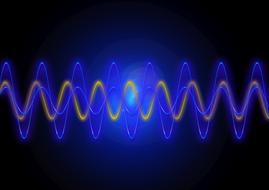 shining blue wave form graphic at dark background