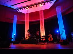 Concert stage with musical instruments and colorful and beautiful lights