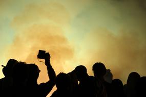 silhouettes of the crowd at the show