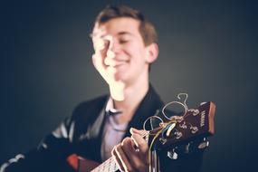 Guy with Guitar Young