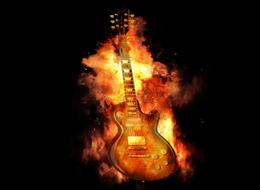 rock guitar on fire on a black background