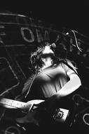 Black and white photo of the Barnett Courtney on the concert