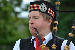 scotchman plays bagpipes