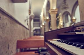 photo of the organ and pews in the church