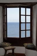 panorama of the sea through an open window