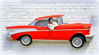 elvis presley in luxury red car, decoration on wall