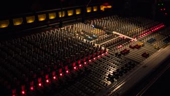 desk of Sound Mixer in dark Studio