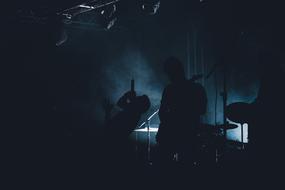 rock band performance in the dark