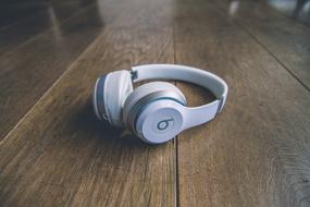 White Headphones on table