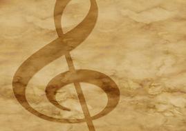 treble clef on parchment as background