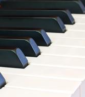 Piano Keyboard, white and black Keys close up