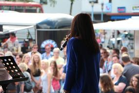 Woman speaking on the live event