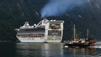 Cruise Ship on milford sound at coast, new zealand