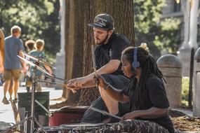 street musicians entertain pedestrians