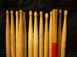 wooden Drum sticks in row