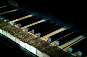 broken keys of an old piano