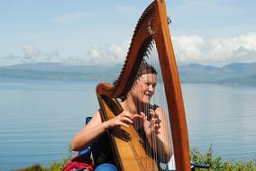 woman playing harp