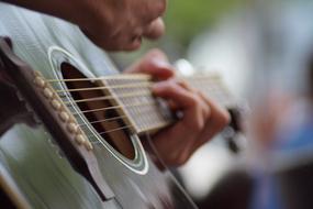 guitar in man's hands