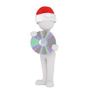 figurine in a hat of santa claus with a CD disk