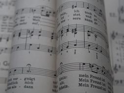 folded music sheets, detail