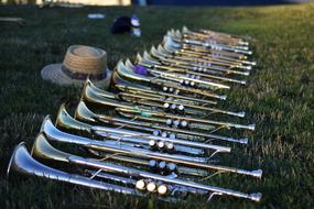 musical pipes lie on the green grass