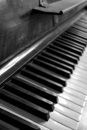 black and white keys on a piano close up