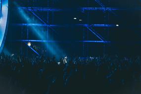 spotlights above Crowd of People, concert
