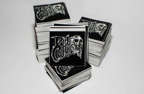 stacks of Stickers with rock music band logo