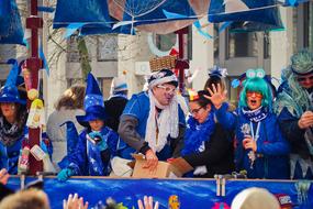 people in blue costumes at the carnival