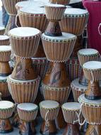 stack of small and big wooden tribal Drums