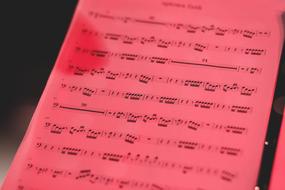 music on red paper
