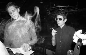 two young men smoking