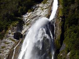 scenic waterfall in New Zealand