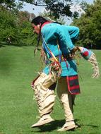 native american man Dancing on lawn