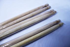 three pairs of packed Drum Sticks