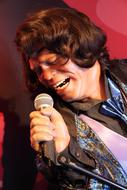 singer with Concert microphone, wax figure