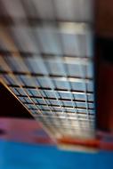 guitar strings close up on blurred background