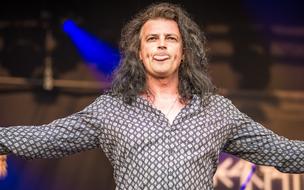 singer on stage during a concert
