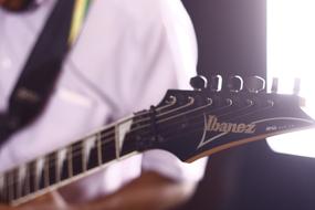 Electric Guitar ibanez person