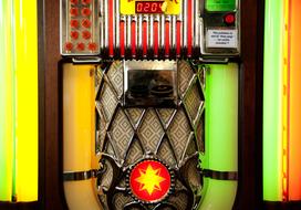 vintage jukebox, partially automated music-playing device