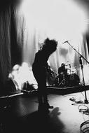 silhouette of a musician on stage