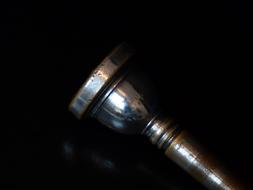 Mouth Piece of Trombone in dark