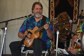 mature man plays guitar, Celtic Music festival