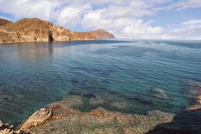 clear Sea and rocky Mountains, scenic coastline
