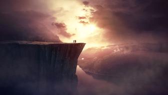 mystical image of two people on a cliff
