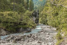 large rubble on the bank of the alpine river