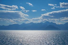blue white sky over mountain seascape
