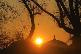 Sunset In The Evening Sky over mosque